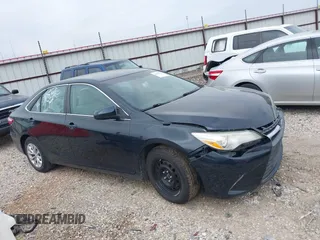 2015 Toyota Camry XLE with VIN 4T4BF1FK2FR461922, listed as a IAAI auction lot 41995064 with 195,943 mi miles. Bid and sale history available at carsss.com. Image 14.