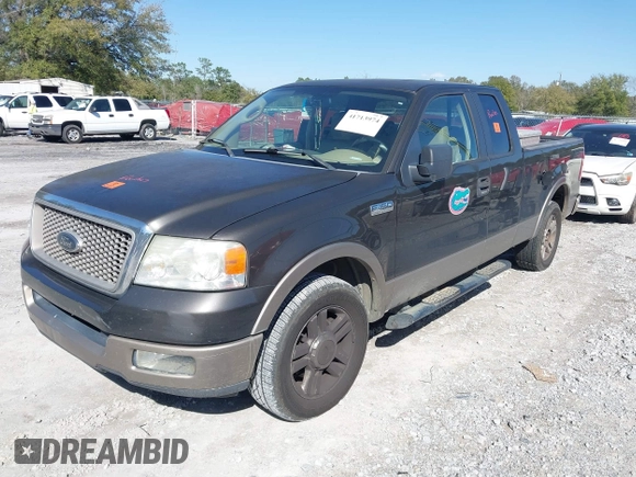 2005 Ford F-150 XLT with VIN 1FTPX12575NA61851, listed as a IAAI auction lot 41713974 with 251,639 mi miles. Bid and sale history available at carsss.com. Image 2.