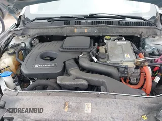 2013 Ford Fusion SE Hybrid with VIN 3FA6P0LUXDR339767, listed as a IAAI auction lot 41920621 with 135,274 mi miles. Bid and sale history available at carsss.com. Image 10.