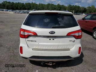 2014 Kia Sorento SX Limited z VIN 5XYKWDA71EG501636, wystawiony jako Copart lot #72324524 z przebiegiem 166 496 mil mil oraz Szkoda całkowita • Salvage title. Historia ofert i sprzedaży dostępna na DreamBid. Obrazek 6.