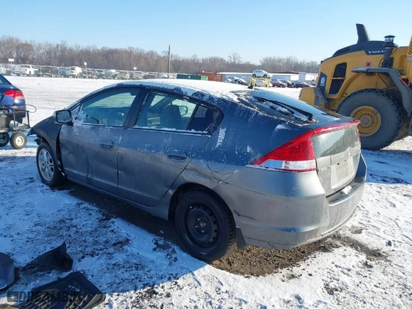 2011 Honda Insight EX with VIN JHMZE2H76BS004162, listed as a IAAI auction lot 41333373 with 287,593 mi miles. Bid and sale history available at carsss.com. Image 3.