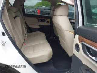 2018 Honda CR-V Touring z VIN 5J6RW1H96JL014087, wystawiony jako IAAI lot #41931640 z przebiegiem Nie podano mil oraz . Historia ofert i sprzedaży dostępna na DreamBid. Obrazek 8.