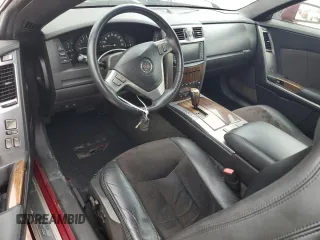 2006 Cadillac XLR z VIN 1G6YX36D165603774, wystawiony jako Copart lot #74369974 z przebiegiem Nie podano mil oraz Szkody całkowita. Historia ofert i sprzedaży dostępna na DreamBid. Obrazek 8.