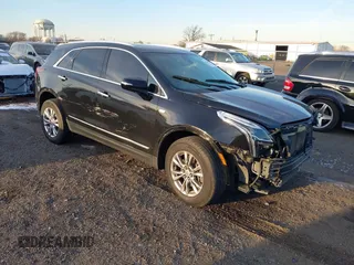 2020 Cadillac XT5 Premium Luxury AWD with VIN 1GYKNDRSXLZ209939, listed as a IAAI auction lot 41166099 with 41,682 mi miles. Bid and sale history available at carsss.com. Image 1.