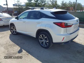 2016 Lexus RX 450h with VIN 2T2BGMCAXGC004844, listed as a IAAI auction lot 41791066 with 100,604 mi miles and . Bid and sale history available at DreamBid. Image 3.