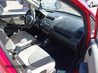 2007 Honda Fit z VIN JHMGD37427S060145, wystawiony jako IAAI lot #42374305 z przebiegiem 282 714 mil mil oraz . Historia ofert i sprzedaży dostępna na DreamBid. Obrazek 5.