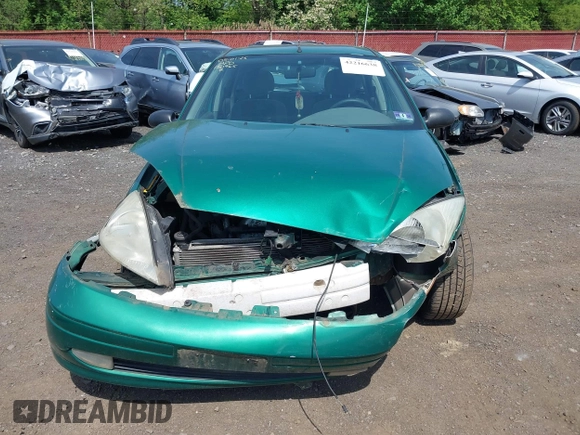 2002 Ford Focus ZX5 z VIN 3FAFP373X2R130965, wystawiony jako IAAI lot #42216638 z przebiegiem 59 236 mil mil oraz . Historia ofert i sprzedaży dostępna na DreamBid. Obrazek 12.