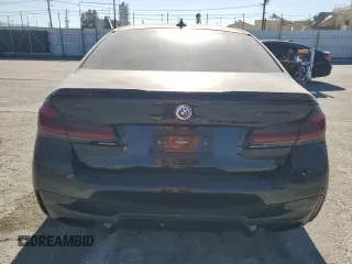 2023 BMW 5 Series M550i xDrive с VIN WBA13BK04PCM97306, выставлен на аукционе Copart как лот 76813754 с пробегом 19 259 миль миль и Списание • Salvage title. История ставок и продаж доступна на DreamBid. Изображение 6.