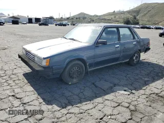 1986 Toyota Camry z VIN JT2SV16E6G0520922, wystawiony jako Copart lot #47146675 z przebiegiem 156 394 mil mil oraz Szkoda całkowita • Salvage title. Historia ofert i sprzedaży dostępna na DreamBid. Obrazek 1.