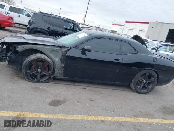 2015 Dodge Challenger R/T with VIN 2C3CDZATXFH712765, listed as a IAAI auction lot 41817210 with 99,535 mi miles and . Bid and sale history available at DreamBid. Image 15.