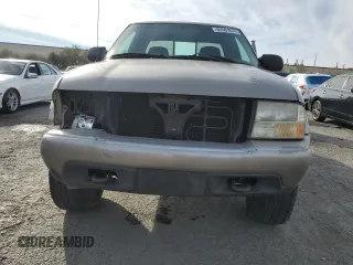 1999 GMC Sonoma SLS w/1SJ Pkg with VIN 1GTCT19W2X8516874, listed as a Copart auction lot 85501674 with 158,205 mi miles and Salvage Title. Bid and sale history available at carsss.com. Image 5.