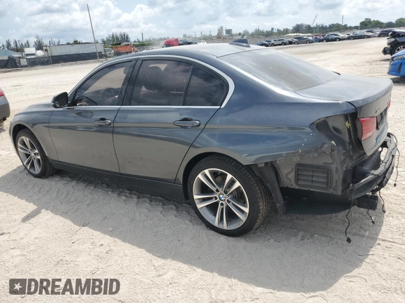 2017 BMW 3 Series 330i xDrive with VIN WBA8D9G56HNU59185, listed as a Copart auction lot 57411935 with 162,865 mi miles and Salvage title. Bid and sale history available at DreamBid. Image 2.