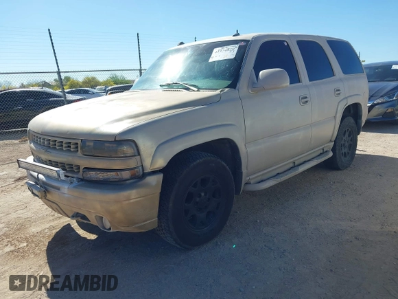 2004 Chevrolet Tahoe Z71 with VIN 1GNEK13T14R182134, listed as a IAAI auction lot 41974829 with 184,536 mi miles. Bid and sale history available at carsss.com. Image 2.