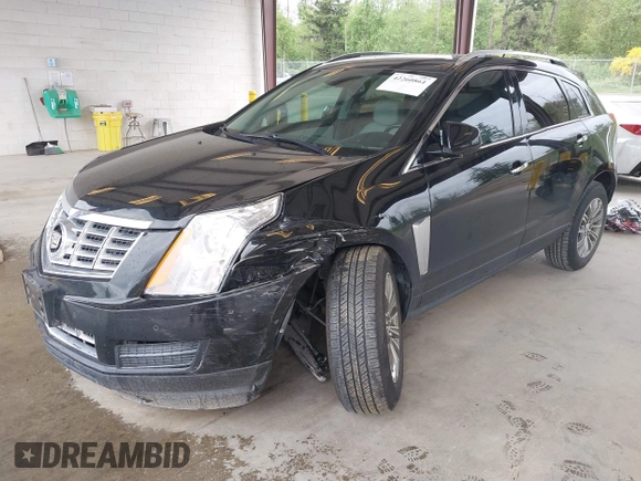 2014 Cadillac SRX Luxury Collection z VIN 3GYFNEE36ES677883, wystawiony jako IAAI lot #42260861 z przebiegiem 51 730 mil mil oraz . Historia ofert i sprzedaży dostępna na DreamBid. Obrazek 2.