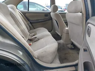 1999 Nissan Altima XE with VIN 1N4DL01D1XC210017, listed as a IAAI auction lot 41199544 with 297,917 mi miles. Bid and sale history available at carsss.com. Image 8.