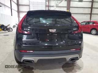 2020 Cadillac XT4 FWD Premium Luxury z VIN 1GYFZCR41LF143039, wystawiony jako Copart lot #57164005 z przebiegiem 24 218 mil mil oraz Nie do naprawy • Non repairable. Historia ofert i sprzedaży dostępna na DreamBid. Obrazek 6.