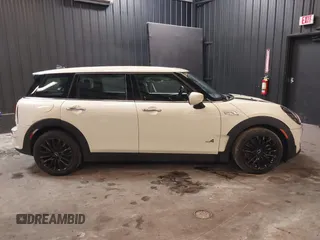 2023 MINI Clubman Cooper S with VIN WMWXJ1C02P2S77645, listed as a IAAI auction lot 41300674 with 34,302 mi miles. Bid and sale history available at carsss.com. Image 13.