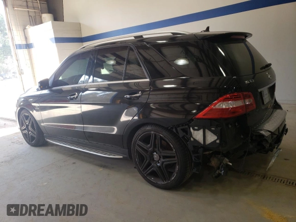 2013 Mercedes-Benz M ML 63 AMG with VIN 4JGDA7EB0DA214628, listed as a Copart auction lot 46523665 with 100,158 mi miles and Salvage Title. Bid and sale history available at carsss.com. Image 2.