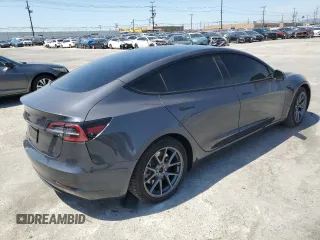 2023 Tesla Model 3 with VIN 5YJ3E1EA8PF616210, listed as a Copart auction lot 49340685 with 38,483 mi miles and Salvage Title. Bid and sale history available at DreamBid. Image 3.