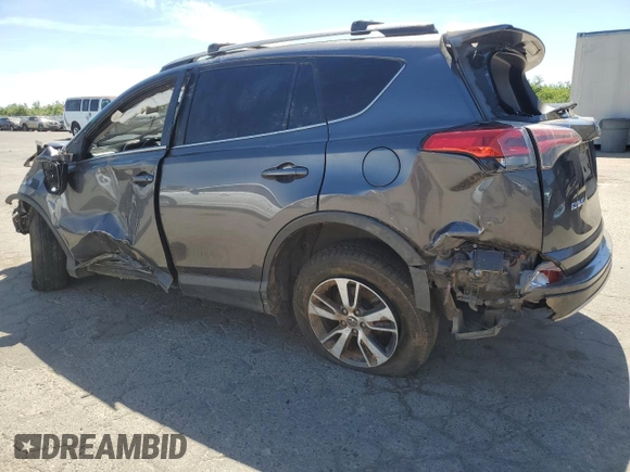 2018 Toyota RAV4 XLE with VIN JTMWFREV6JJ172451, listed as a Copart auction lot 58095775 with Not provided miles and Salvage title. Bid and sale history available at DreamBid. Image 2.
