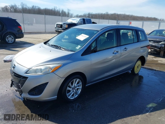 2013 Mazda 5 Sport with VIN JM1CW2BL6D0146696, listed as a IAAI auction lot 41657255 with 142,939 mi miles and . Bid and sale history available at DreamBid. Image 2.