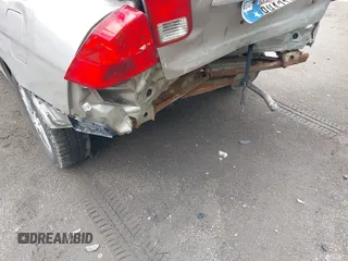 2005 Honda Civic LX z VIN 2HGES16555H579290, wystawiony jako IAAI lot #42190612 z przebiegiem 128 019 mil mil oraz . Historia ofert i sprzedaży dostępna na DreamBid. Obrazek 6.