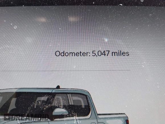 2023 Rivian R1T Adventure z VIN 7FCTGBAA9PN027894, wystawiony jako IAAI lot #42061339 z przebiegiem 5047 mil mil oraz . Historia ofert i sprzedaży dostępna na DreamBid. Obrazek 15.