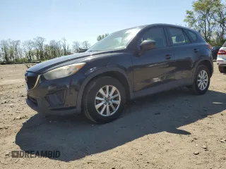 2014 Mazda CX-5 Sport z VIN JM3KE4BE8E0342157, wystawiony jako Copart lot #52856875 z przebiegiem 127 738 mil mil oraz Szkoda całkowita • Salvage title. Historia ofert i sprzedaży dostępna na DreamBid. Obrazek 1.