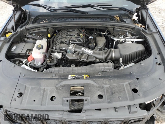 2023 Jeep Grand Cherokee Altitude with VIN 1C4RJGAG7PC573429, listed as a Copart auction lot 58052174 with 9,704 mi miles and Salvage title. Bid and sale history available at DreamBid. Image 12.
