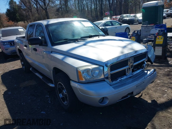 2006 Dodge Dakota SLT z VIN 1D7HW48N76S507358, wystawiony jako IAAI lot #41876899 z przebiegiem 131 880 mil mil oraz . Historia ofert i sprzedaży dostępna na DreamBid. Obrazek 1.