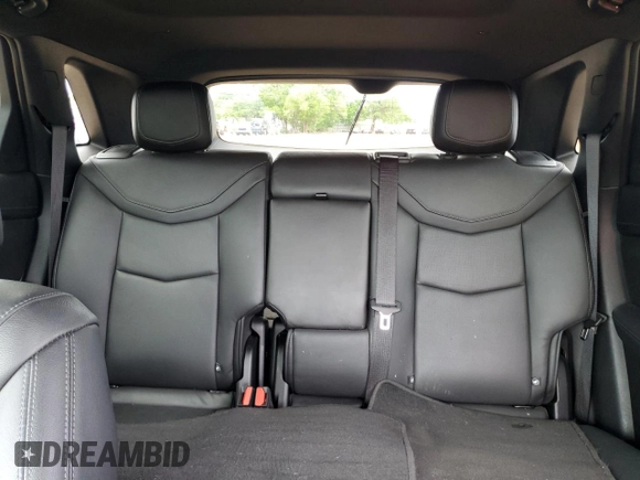 2020 Cadillac XT5 Premium Luxury FWD z VIN 1GYKNCRS1LZ191485, wystawiony jako Copart lot #54657525 z przebiegiem Nie podano mil oraz Szkoda całkowita • Salvage title. Historia ofert i sprzedaży dostępna na DreamBid. Obrazek 10.