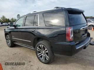 2018 GMC Yukon Denali with VIN 1GKS1CKJ8JR201028, listed as a Copart auction lot 83478394 with 133,302 mi miles and Salvage Title. Bid and sale history available at carsss.com. Image 2.