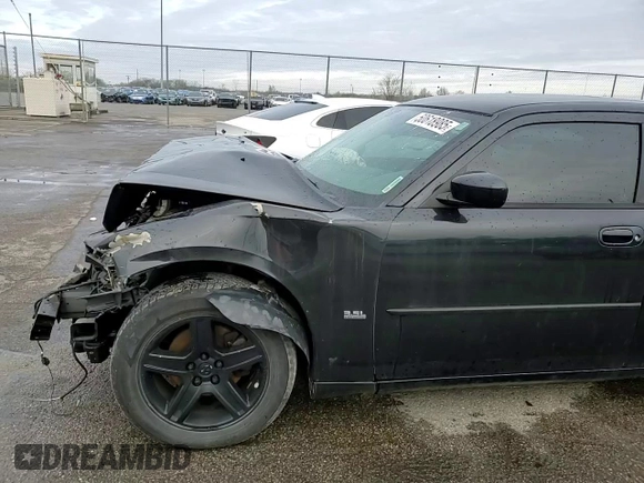2010 Dodge Charger SXT with VIN 2B3CA3CV7AH273552, listed as a Copart auction lot 50618985 with Not Provided miles and Salvage Title. Bid and sale history available at DreamBid. Image 11.