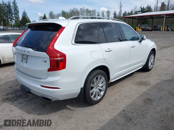 2016 Volvo XC90 T6 Momentum with VIN YV4A22PK8G1043665, listed as a IAAI auction lot 42004230 with 156,681 mi miles. Bid and sale history available at carsss.com. Image 4.