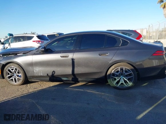 2024 BMW i5 eDrive40 with VIN WBY33FK09RCR42126, listed as a IAAI auction lot 41370577 with 9,601 mi miles and . Bid and sale history available at DreamBid. Image 14.