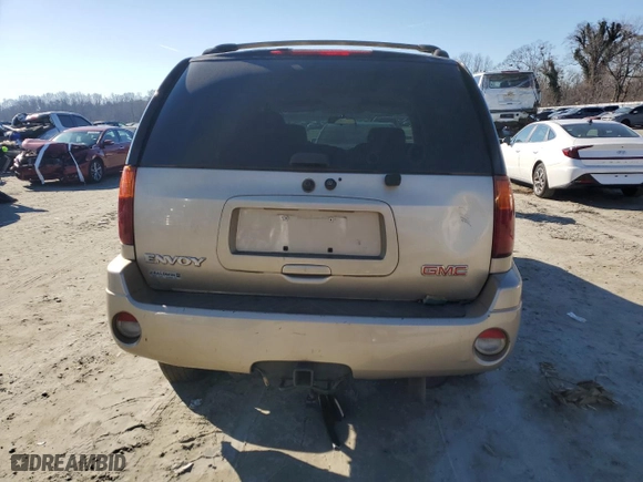 2004 GMC Envoy SLT with VIN 1GKDS13S442209545, listed as a Copart auction lot 84736874 with 255,371 mi miles and Salvage Title. Bid and sale history available at carsss.com. Image 6.
