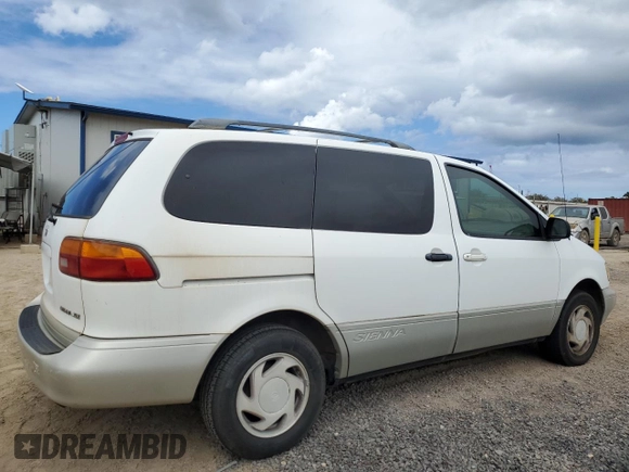 1999 Toyota Sienna LE with VIN 4T3ZF13C4XU134680, listed as a Copart auction lot 74044544 with 127,954 mi miles and Clean Title. Bid and sale history available at carsss.com. Image 3.