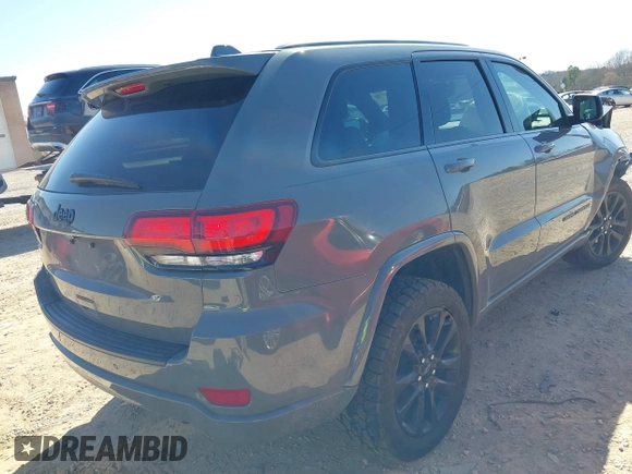 2019 Jeep Grand Cherokee Laredo E with VIN 1C4RJFAG2KC855108, listed as a IAAI auction lot 41780277 with 81,283 mi miles and . Bid and sale history available at DreamBid. Image 4.