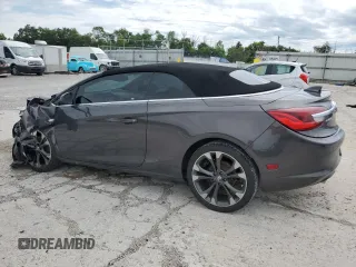 2016 Buick Cascada Premium с VIN W04WT3N53GG112343, выставлен на аукционе Copart как лот 62080574 с пробегом 24 000 миль миль и Списание • Salvage title. История ставок и продаж доступна на DreamBid. Изображение 2.