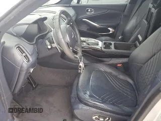 2021 Aston Martin DBX z VIN SCFVUJAW4MTV03930, wystawiony jako Copart lot #73946614 z przebiegiem Nie podano mil oraz Nie do naprawy. Historia ofert i sprzedaży dostępna na DreamBid. Obrazek 7.