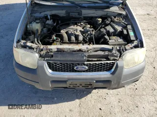 2002 Ford Escape XLT Choice with VIN 1FMCU04162KB00207, listed as a Copart auction lot 56414275 with 143,085 mi miles and Salvage title. Bid and sale history available at DreamBid. Image 11.