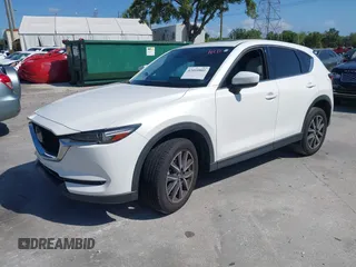 2018 Mazda CX-5 Grand Touring with VIN JM3KFADM2J1422512, listed as a IAAI auction lot 42010801 with 48,567 mi miles and . Bid and sale history available at DreamBid. Image 17.
