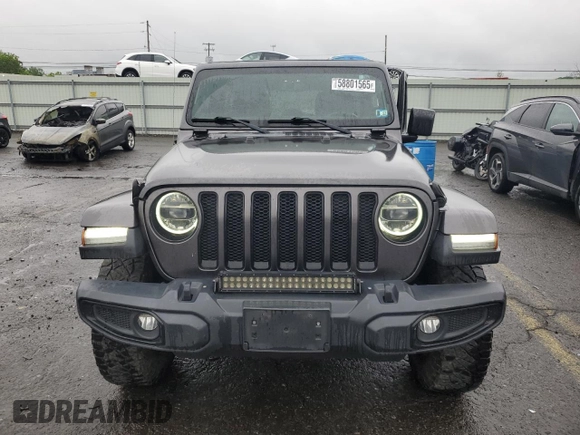 2020 Jeep Wrangler Unlimited Sahara Altitude with VIN 1C4HJXEM5LW293741, listed as a Copart auction lot 58801565 with 97,460 mi miles and Salvage title. Bid and sale history available at DreamBid. Image 5.