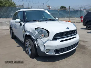 2016 MINI Countryman S z VIN WMWZC3C51GWT10248, wystawiony jako IAAI lot #42359191 z przebiegiem 77 157 mil mil oraz . Historia ofert i sprzedaży dostępna na DreamBid. Obrazek 1.