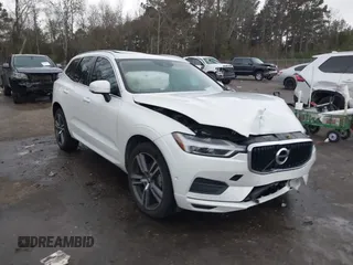 2019 Volvo XC60 Momentum with VIN LYV102DK9KB319379, listed as a IAAI auction lot 41136600 with 73,063 mi miles and . Bid and sale history available at DreamBid. Image 1.
