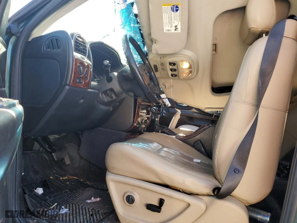 2005 GMC Envoy XL SLT with VIN 1GKET16S456191216, listed as a Copart auction lot 73719144 with 147,365 mi miles and Salvage Title. Bid and sale history available at carsss.com. Image 7.