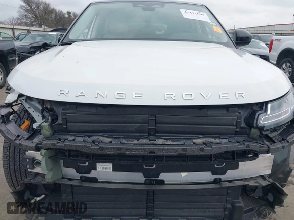 2023 Land Rover Range Rover Evoque S z VIN SALZJ2FX1PH206131, wystawiony jako IAAI lot #41492607 z przebiegiem 15 936 mil mil oraz . Historia ofert i sprzedaży dostępna na DreamBid. Obrazek 18.