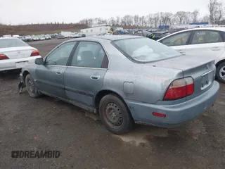 1996 Honda Accord LX with VIN 1HGCD5631TA169122, listed as a IAAI auction lot 42022239 with 164,191 mi miles and . Bid and sale history available at carsss.com. Image 3.