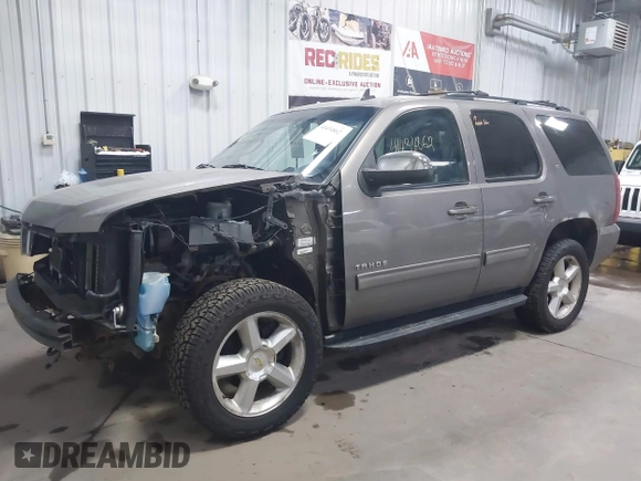 2011 Chevrolet Tahoe LT with VIN 1GNSKBE03BR268246, listed as a IAAI auction lot 41434862 with 250,991 mi miles and . Bid and sale history available at DreamBid. Image 19.
