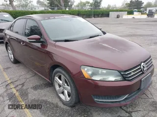 2013 Volkswagen Passat Wolfsburg Edition with VIN 1VWAP7A38DC136413, listed as a IAAI auction lot 42022470 with 265,221 mi miles. Bid and sale history available at carsss.com. Image 1.